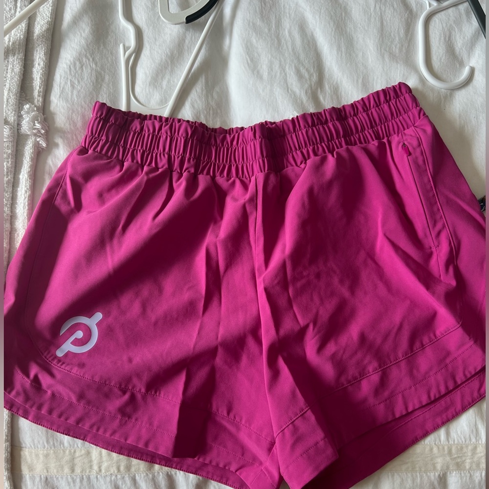 Peloton lined hot pink shorts size S
